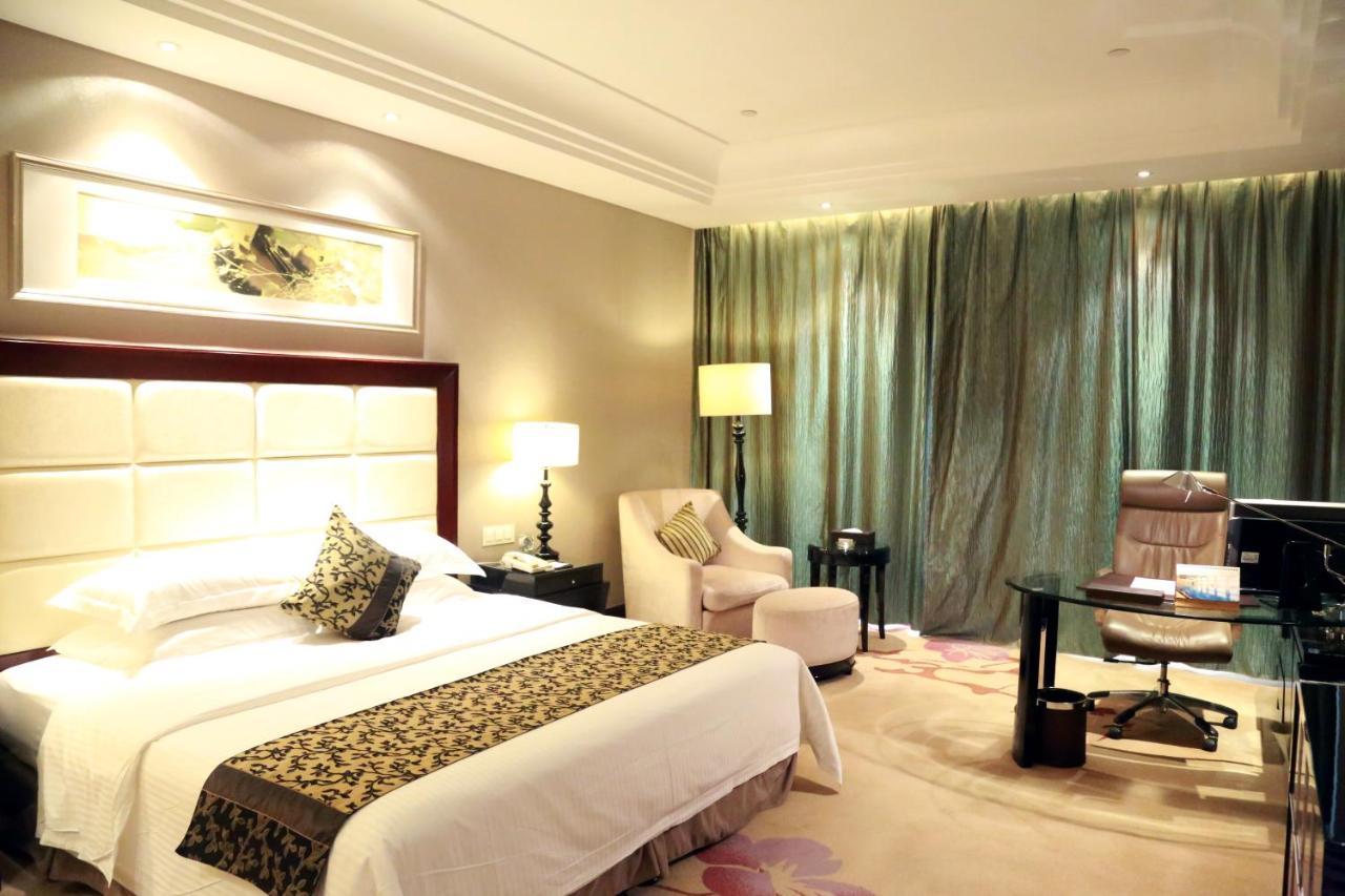 Hotel Wyndham Xinyang Downtown Extérieur photo