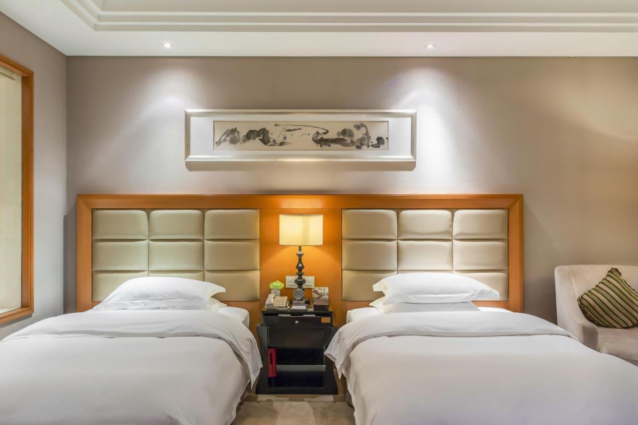 Hotel Wyndham Xinyang Downtown Extérieur photo