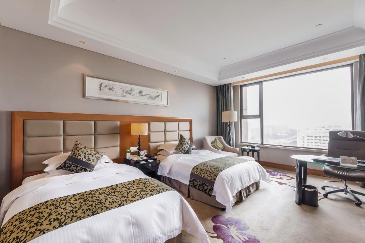 Hotel Wyndham Xinyang Downtown Extérieur photo