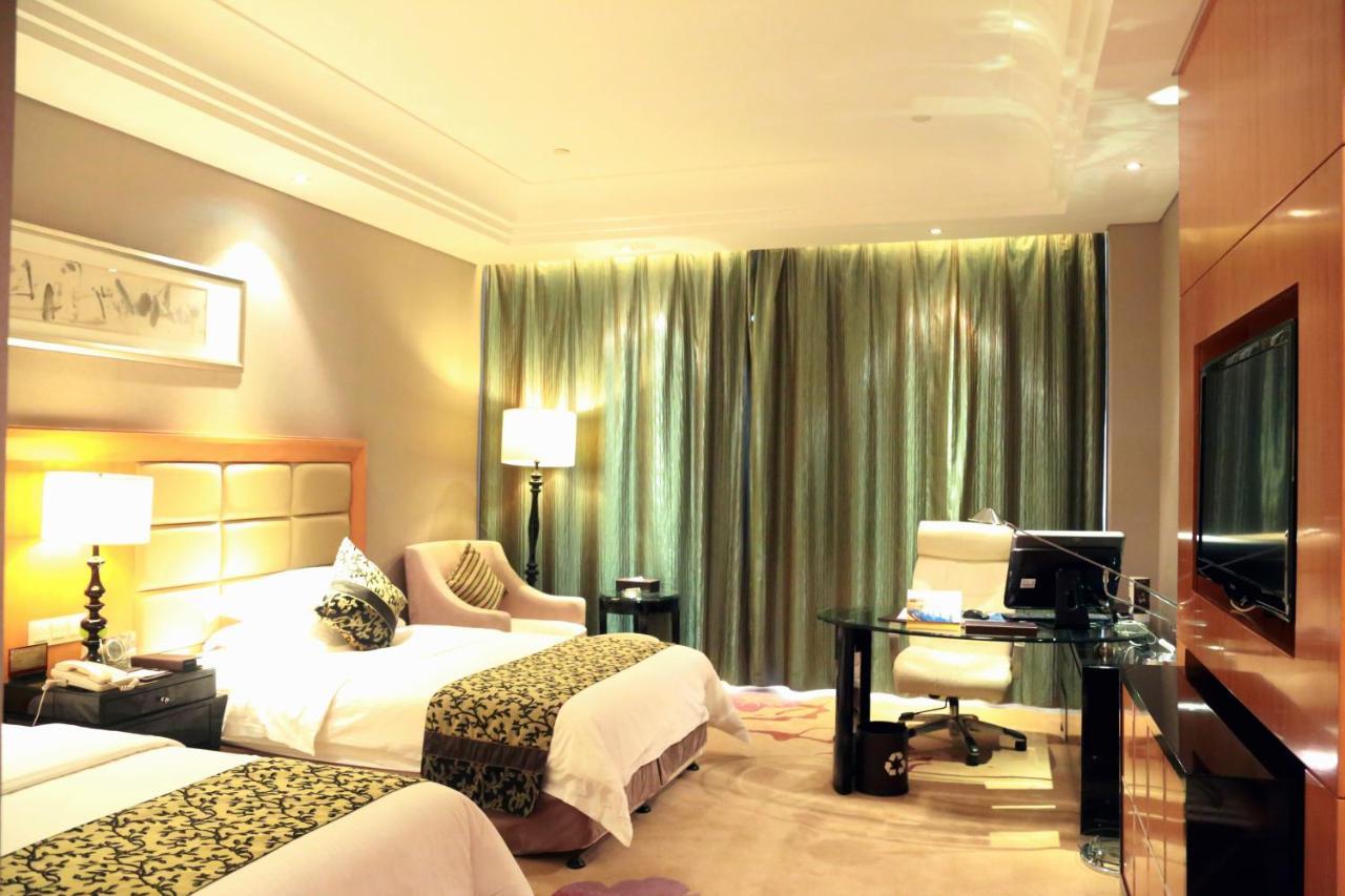 Hotel Wyndham Xinyang Downtown Extérieur photo