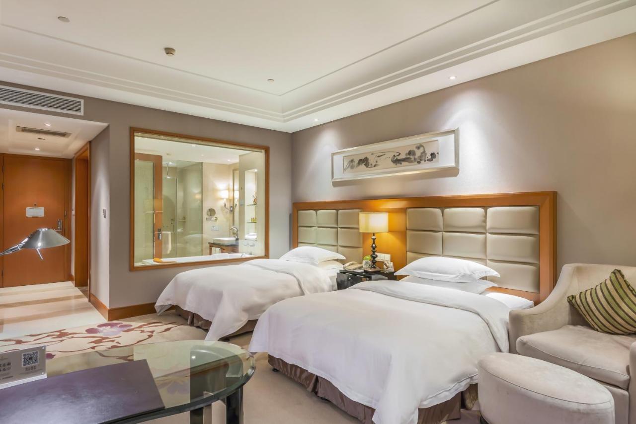 Hotel Wyndham Xinyang Downtown Extérieur photo