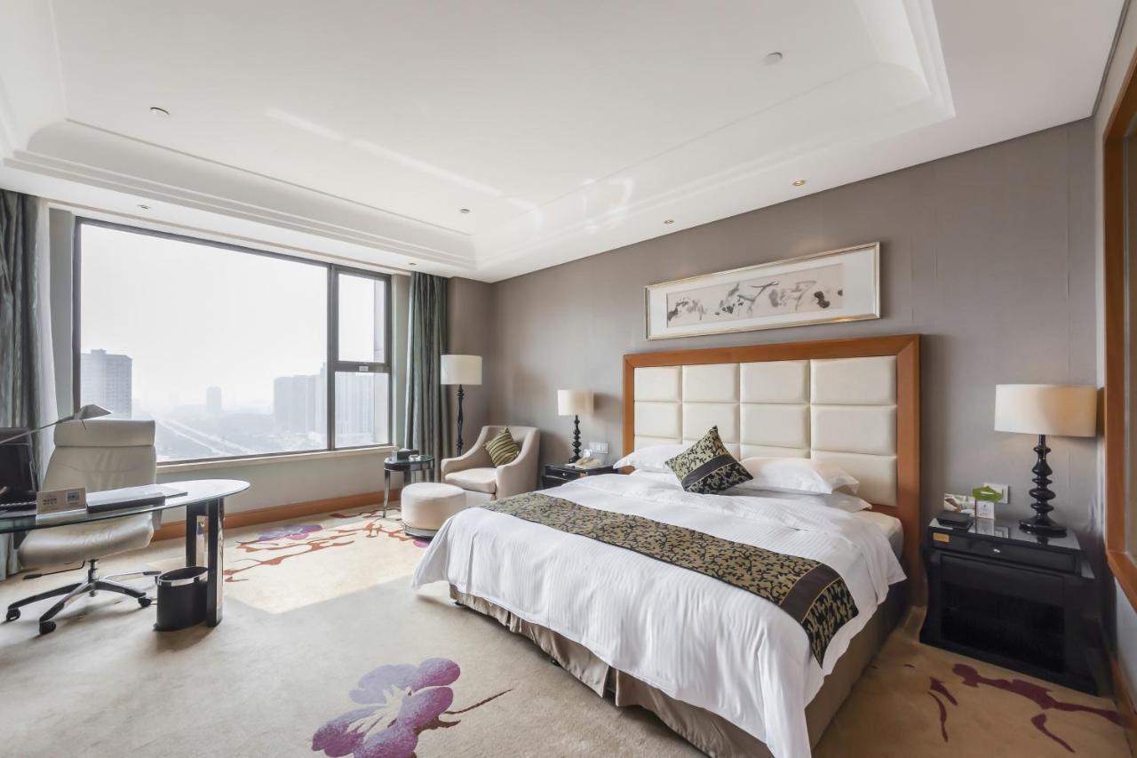 Hotel Wyndham Xinyang Downtown Extérieur photo