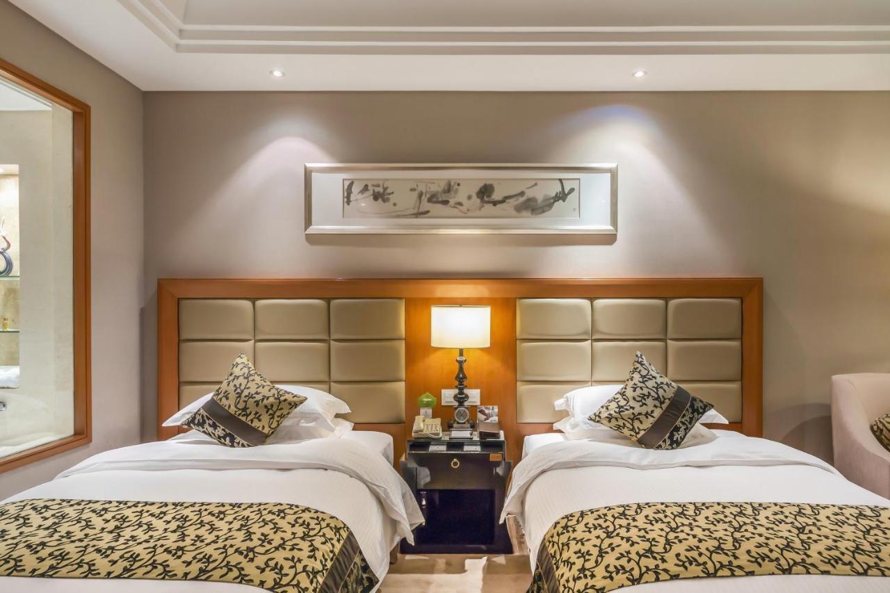 Hotel Wyndham Xinyang Downtown Extérieur photo