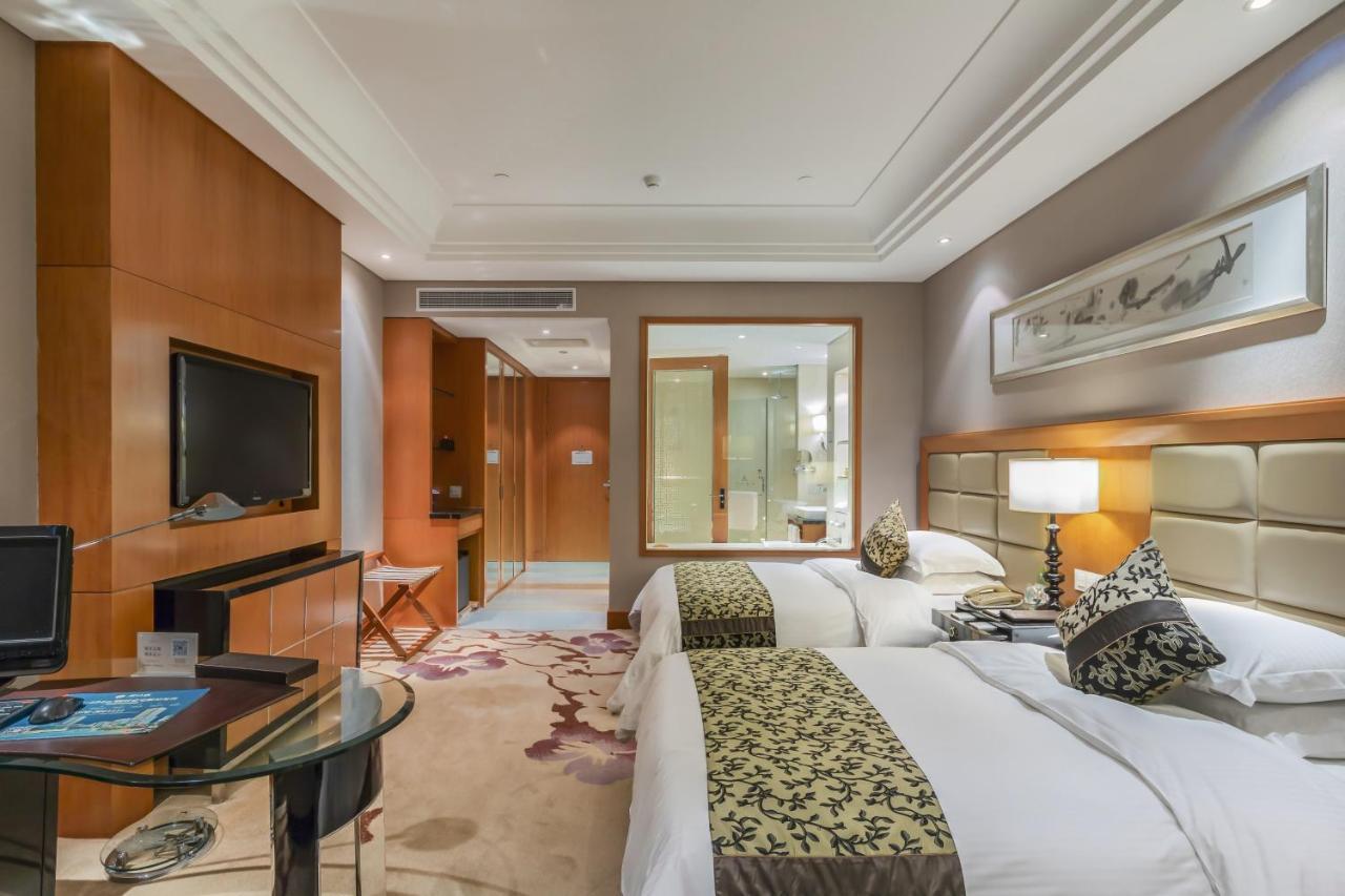 Hotel Wyndham Xinyang Downtown Extérieur photo