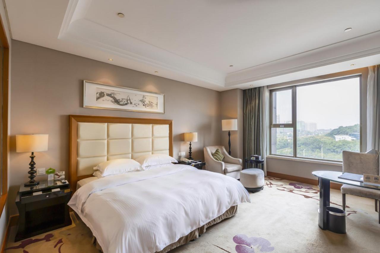 Hotel Wyndham Xinyang Downtown Extérieur photo