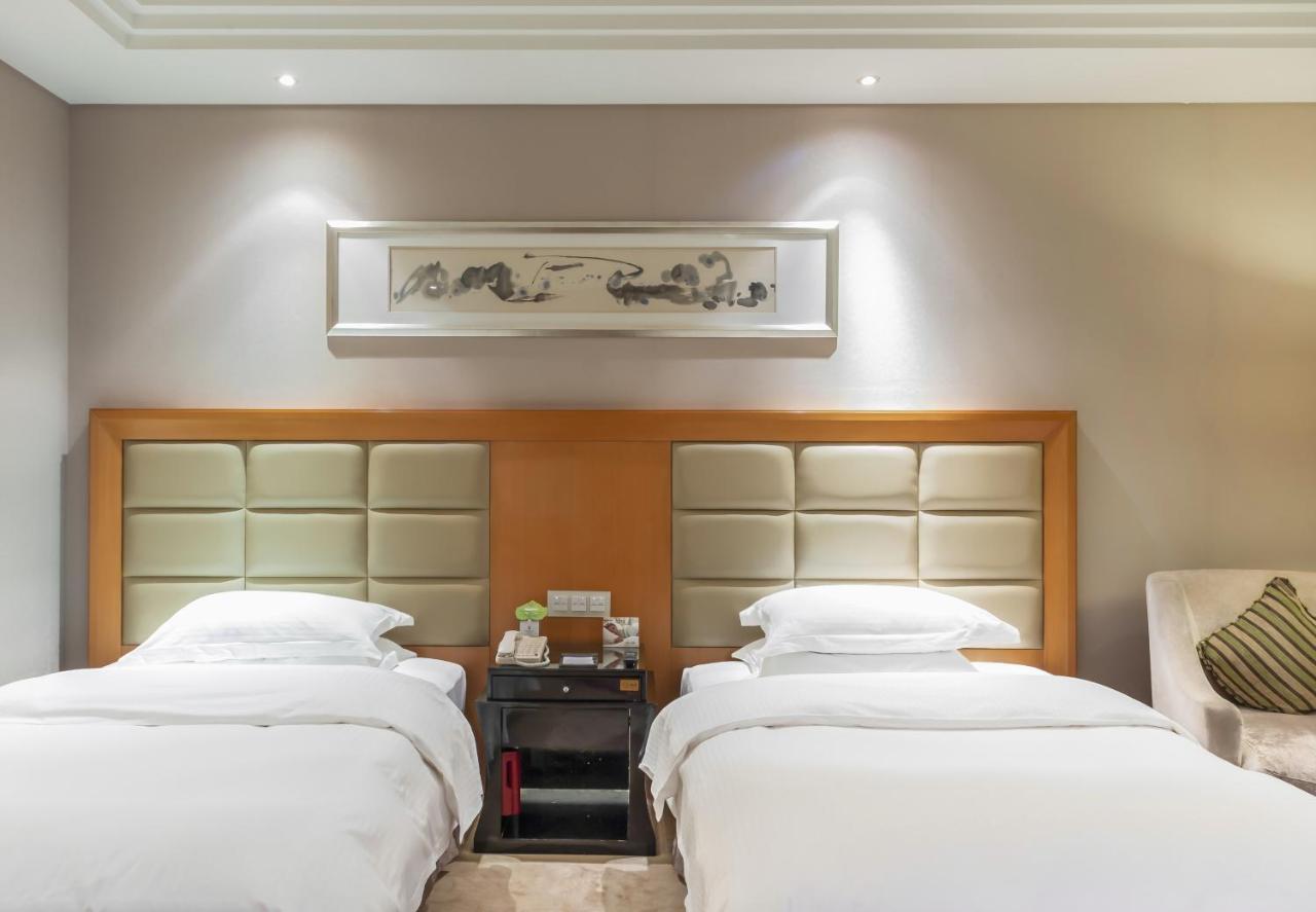 Hotel Wyndham Xinyang Downtown Extérieur photo