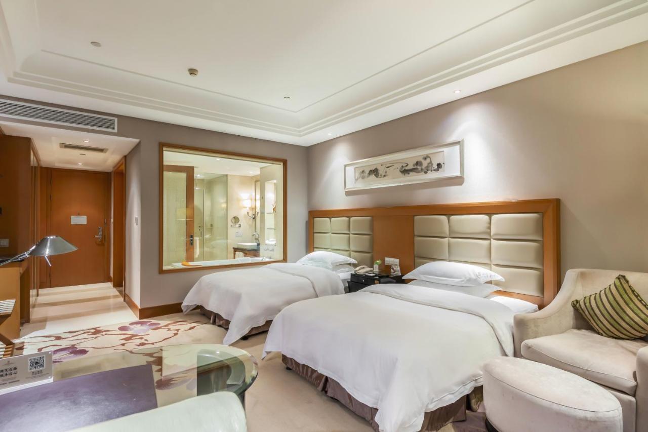 Hotel Wyndham Xinyang Downtown Extérieur photo