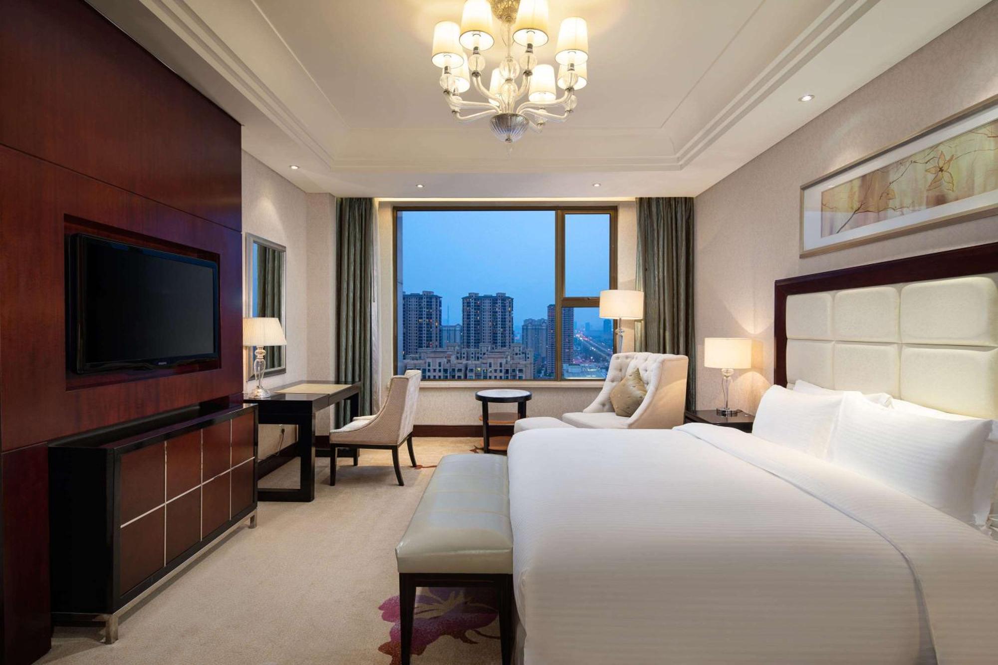 Hotel Wyndham Xinyang Downtown Extérieur photo